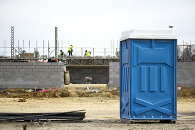 portable toilet on construction site