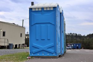 porta potties near a mobile building